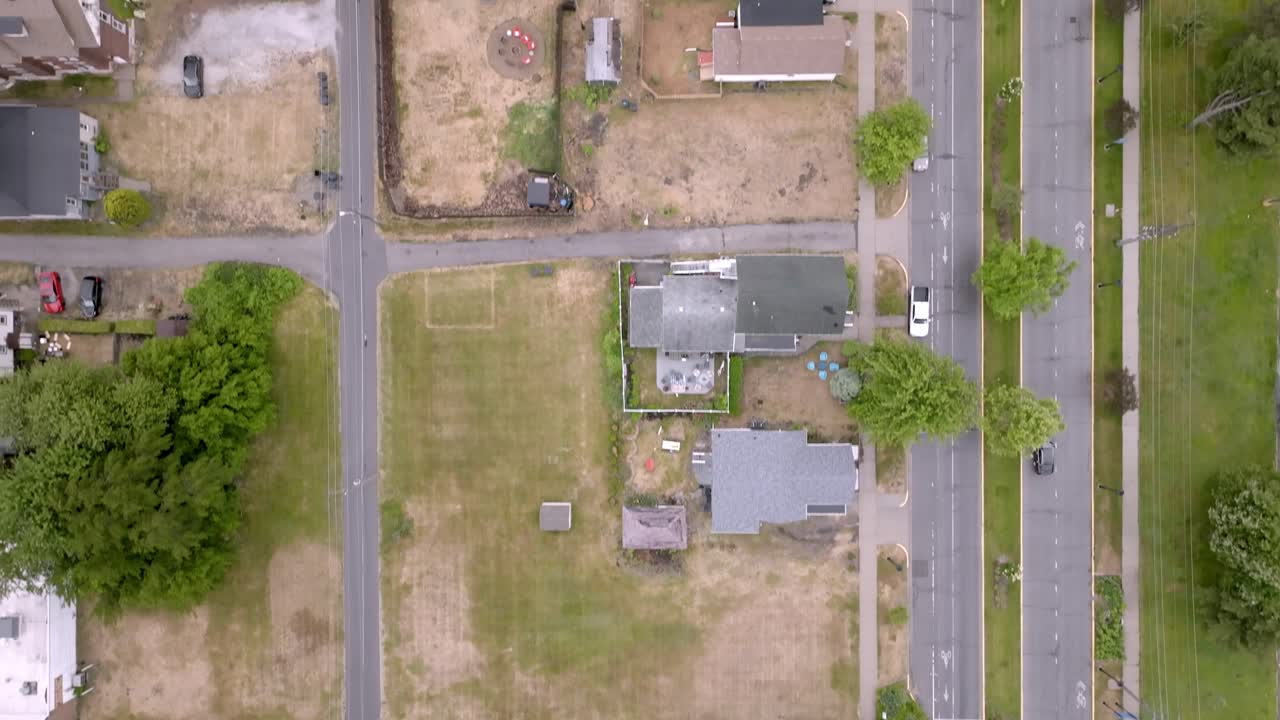 Neighborhood in Michigan City, Indiana with drone video overhead and moving forward