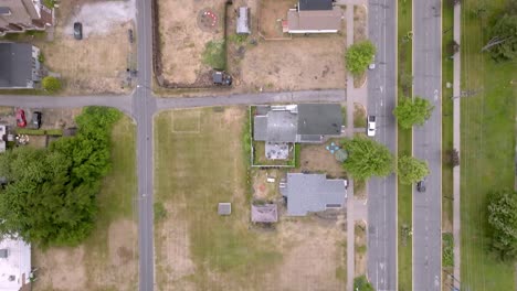 neighborhood in michigan city, indiana with drone video overhead and moving forward