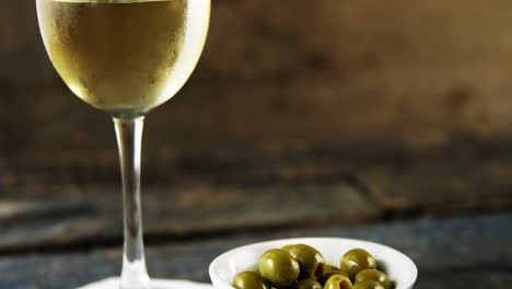 Wine-glass-and-olives