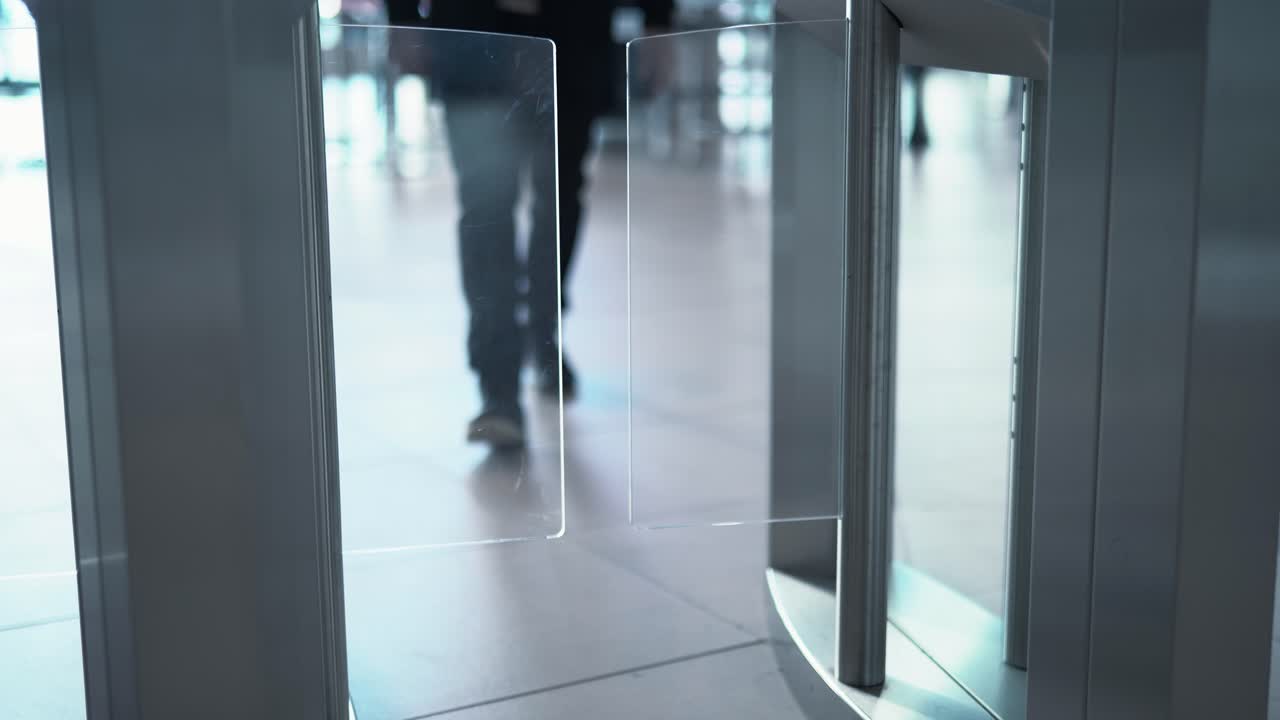 Person walking through security gate