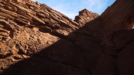 a low angle of the stone walls and window of the largest pueblo at wupatki national monument in arizona