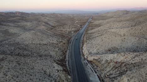 Aerial-View-Of-car-Driving-Along-Highway-N-25-In-Baluchistan