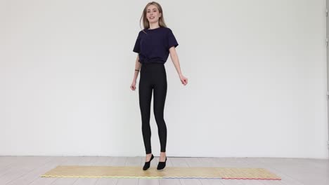 young woman exercising indoors