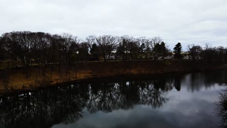 low drive across the glassy water of ruddiman lagoon