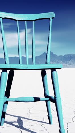 lonely blue chair in the desert