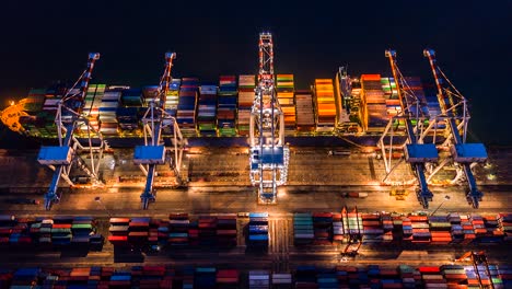 aerial view, 4k.time lapse industrial port with container port where is a part of shipping