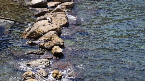 waves hitting rocks along sorrento's coast