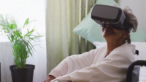 Senior-woman-in-social-distancing-using-VR-headset