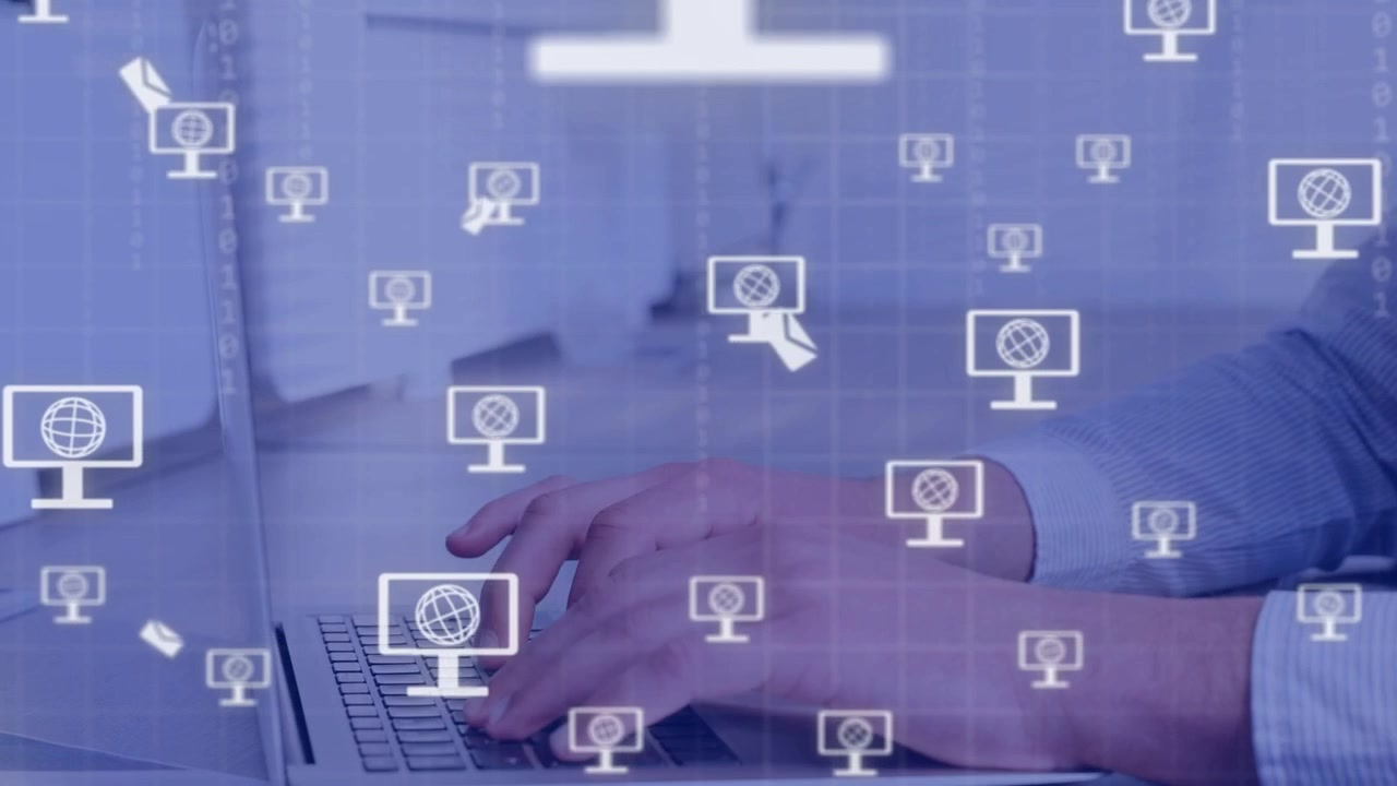 Man typing laptop at desk, monitor icon appearing sending mail over keys, binary showing tech flow