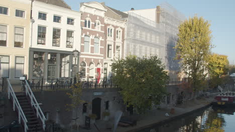 pan past beautiful old house to stunning canal in utrecht city center in the netherlands