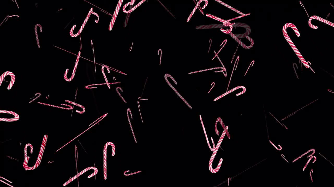 piruletas voladoras en un fondo negro para la composición. bastones de caramelo rojos