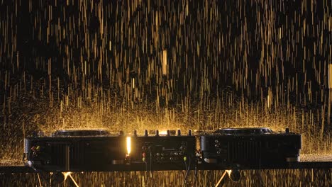 dj mixer under sparkling rain