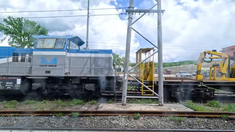 various trains and equipment in florence train yard