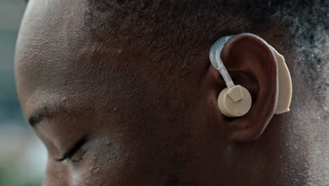 close-up of a person wearing a hearing aid