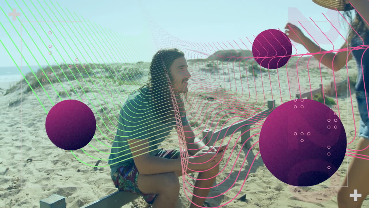 Person sitting on beach with colorful abstract animation overlaying scene