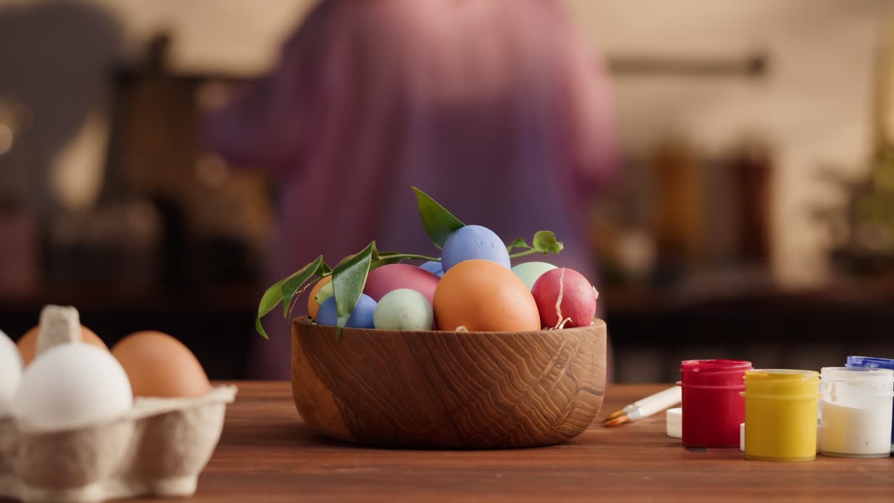 Happy Easter holiday. Colored eggs close-up. Preparing for Easter, painting and decorating eggs. Christian celebration, family traditions.