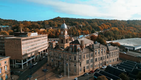 Aerial drone footage of the English market town centre of Dewsbury in West Yorkshire in the UK showing the historical town centre and the Dewsbury townhall