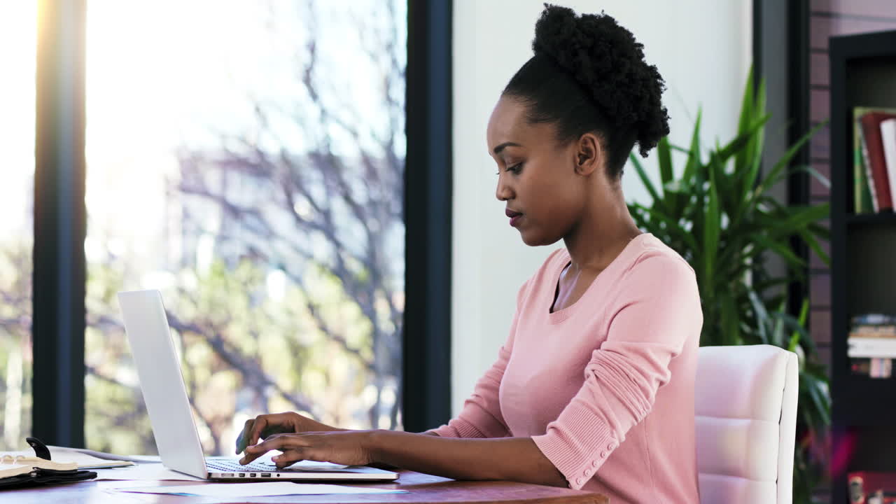 Business manager, black woman on laptop working
