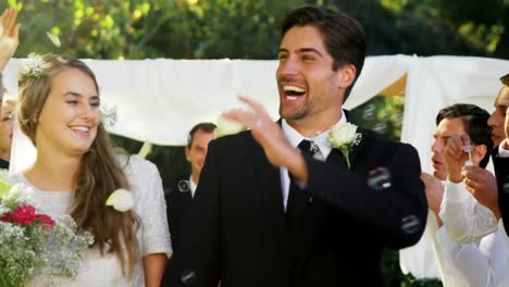 animation of circle over married caucasian couple smiling