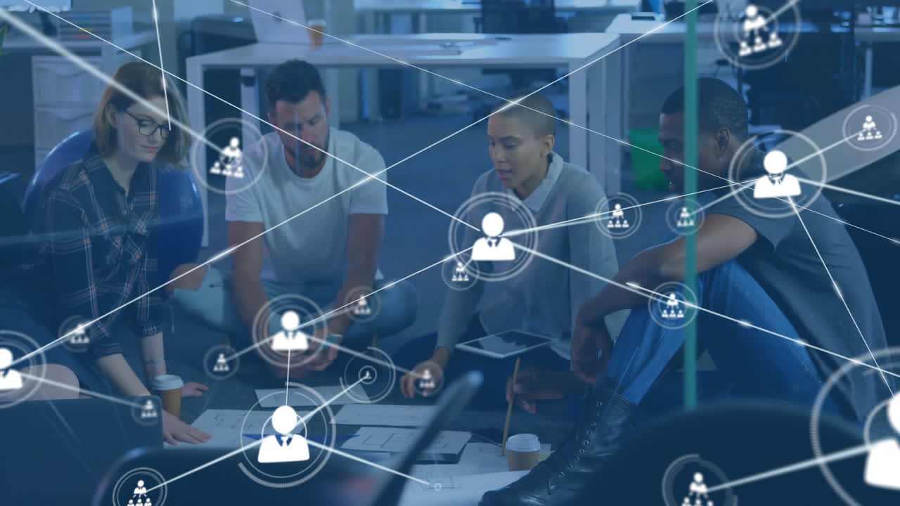 Animation of network of connections with people icons over diverse business people in office
