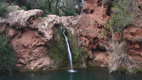 Pego-do-Inferno-waterfall-drone-aerial-view-in-Tavira-Algarve,-Portugal