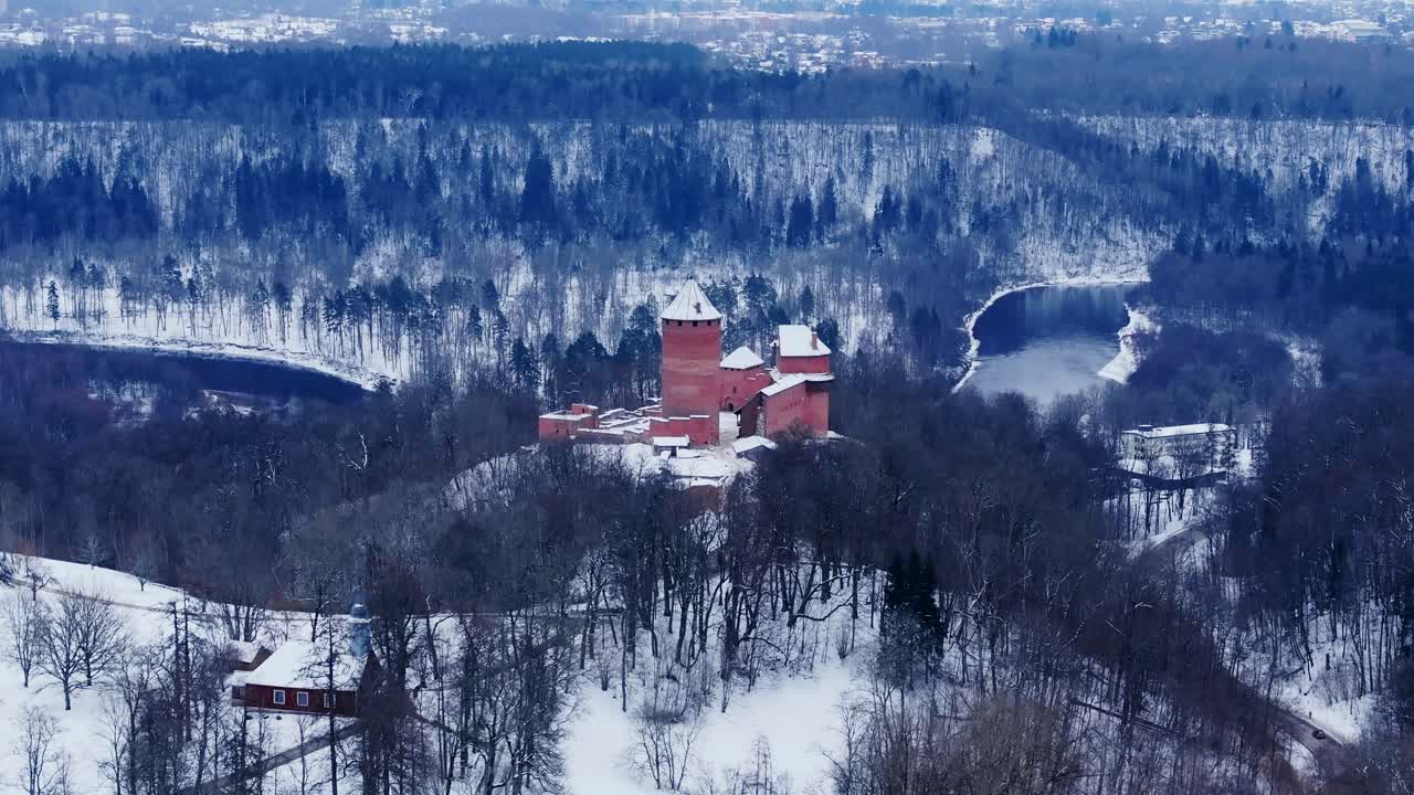 Aerial shot of Turaida castle in Latvia highlights medieval romance and legend
