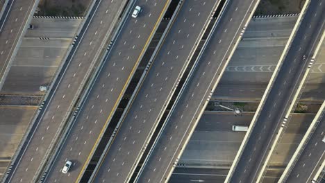 aerial top view of highway, transport city junction road with car on intersection cross road