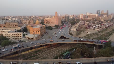 aerial flying over of jinnah bridge and flyover over rotary food park in karachi