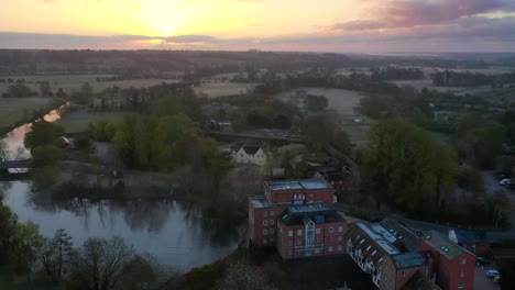 a drone flight from dedham mill towards the sunrise over lawford and manningtree.