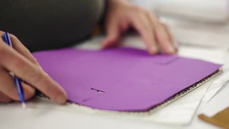 crafting with purple paper and cardboard