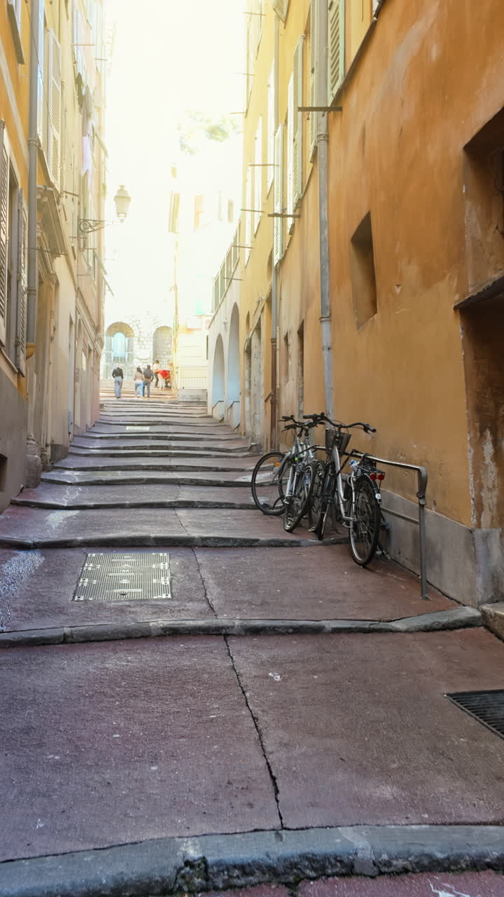 Stairs on the streets of the Old Town of Nice, France in daylight. Vertical