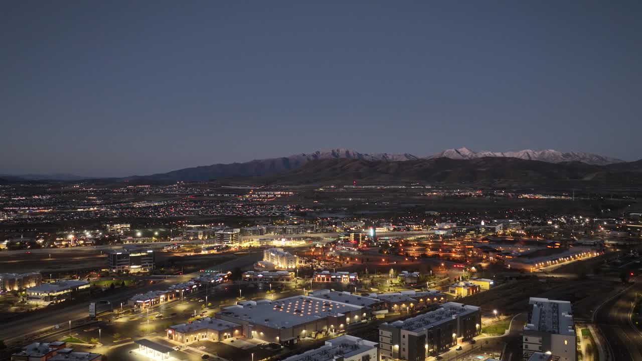 Glowing Lights From Business Park Buildings During Night At Silicon Slopes In Lehi, Utah. Aerial Flyover