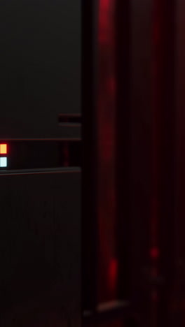 close-up of a server rack with red lights