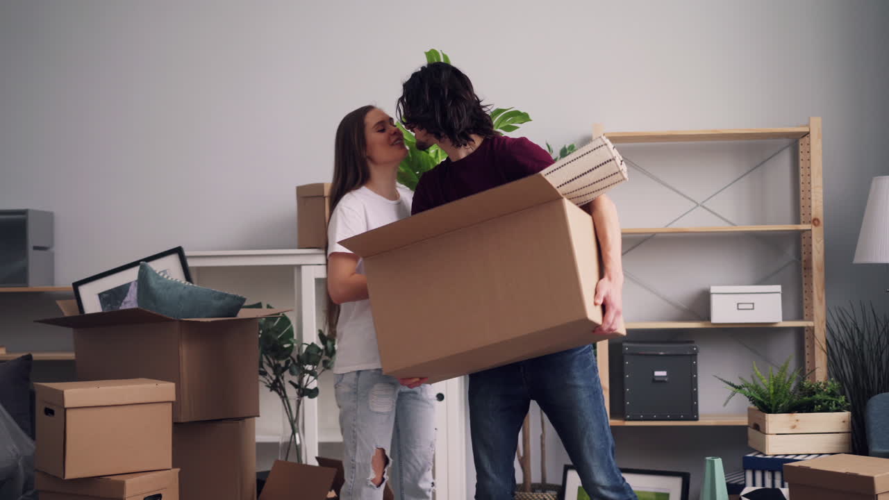 Happy Couple Moving Into Their New Home