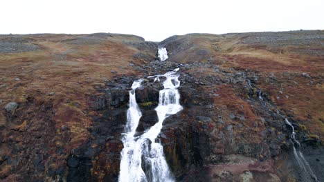 Aerial: Rjukandafoss waterfall, a hidden treasure amidst Iceland&#039;s pristine wilderness