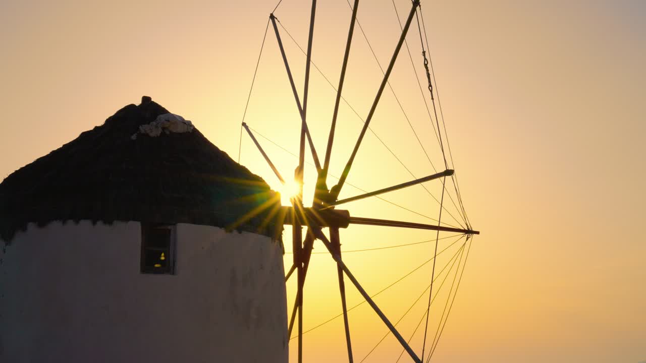 Sunset golden hour of an old windmill on Mykonos Island, Greece