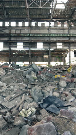 Abandoned Industrial Buildings. Abandoned industrial creepy warehouse inside old dark factory building Vertical video