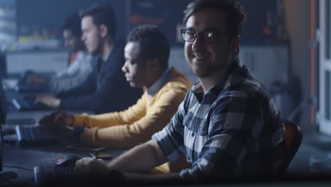 team of programmers working on computers