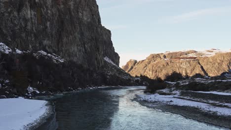 static panoramic view of rio de las vueltas with contrasting light and shade