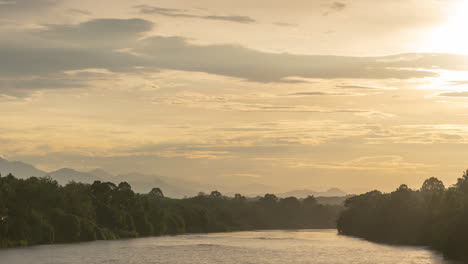 tranquil river landscape at golden hour