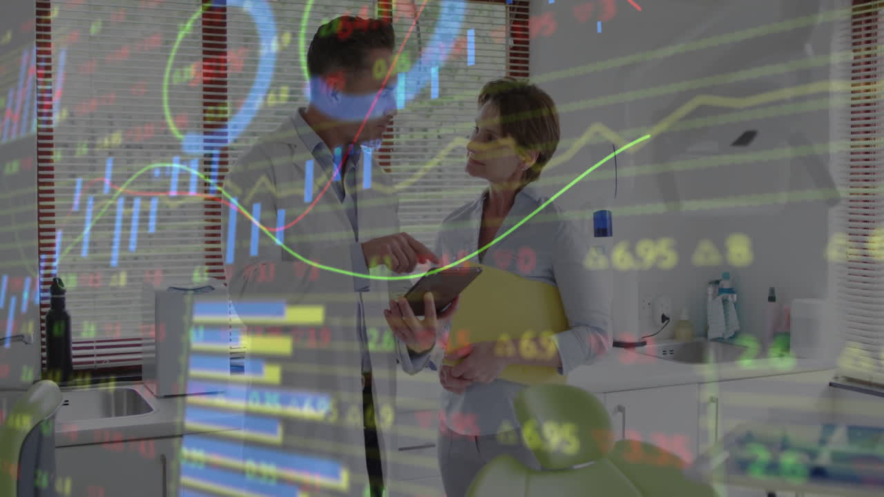 In laboratory, scientists discussing data analysis with animation of financial graphs