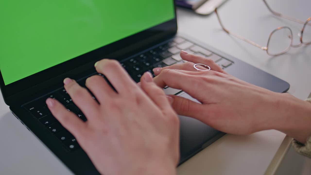 Businesswoman hands typing chromakey laptop at workplace closeup. Lady texting