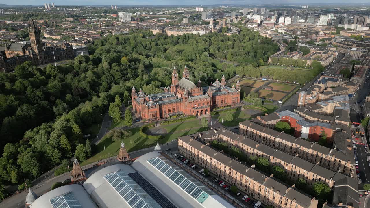 Aerial orbit around Glasgow's Kelvingrove Art Gallery and Museum in Glasgow West End district, Scotland, UK