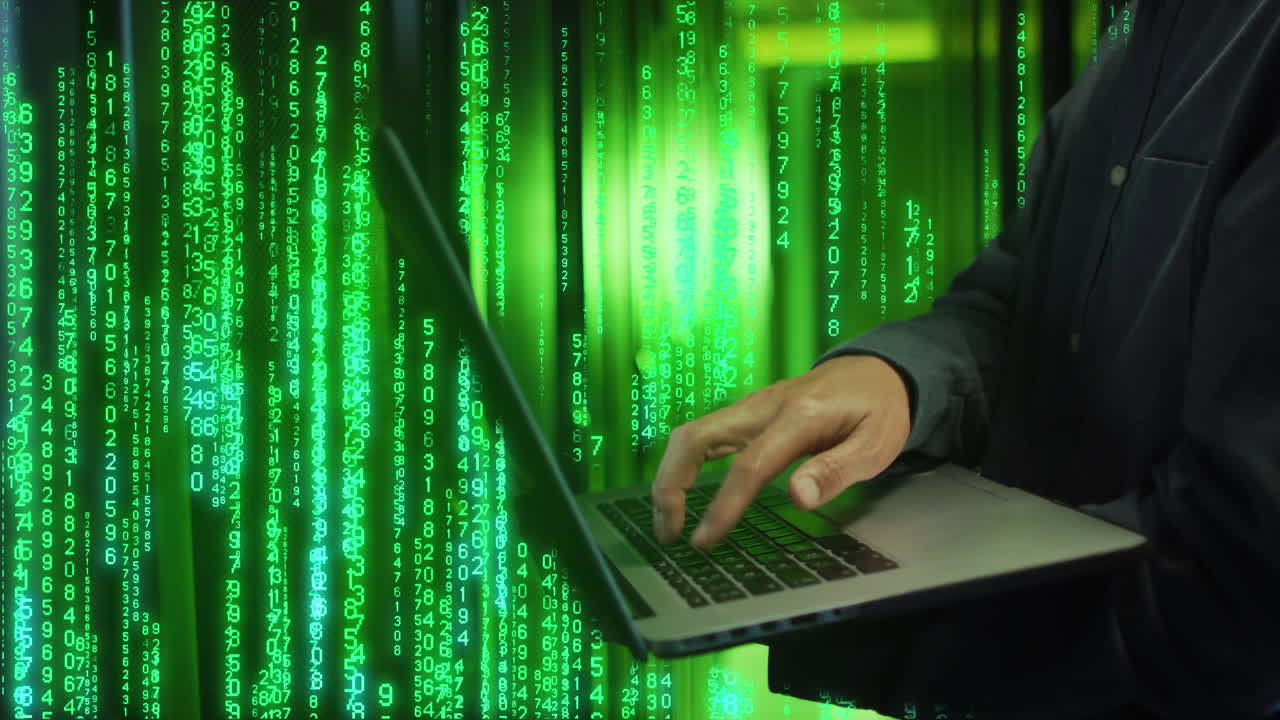 Animation of binary coding over caucasian male worker using laptop in server room