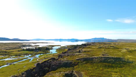 Aerial-establishing-shot-of-the-Thingvellir-canyon-and-surrounding-landscape