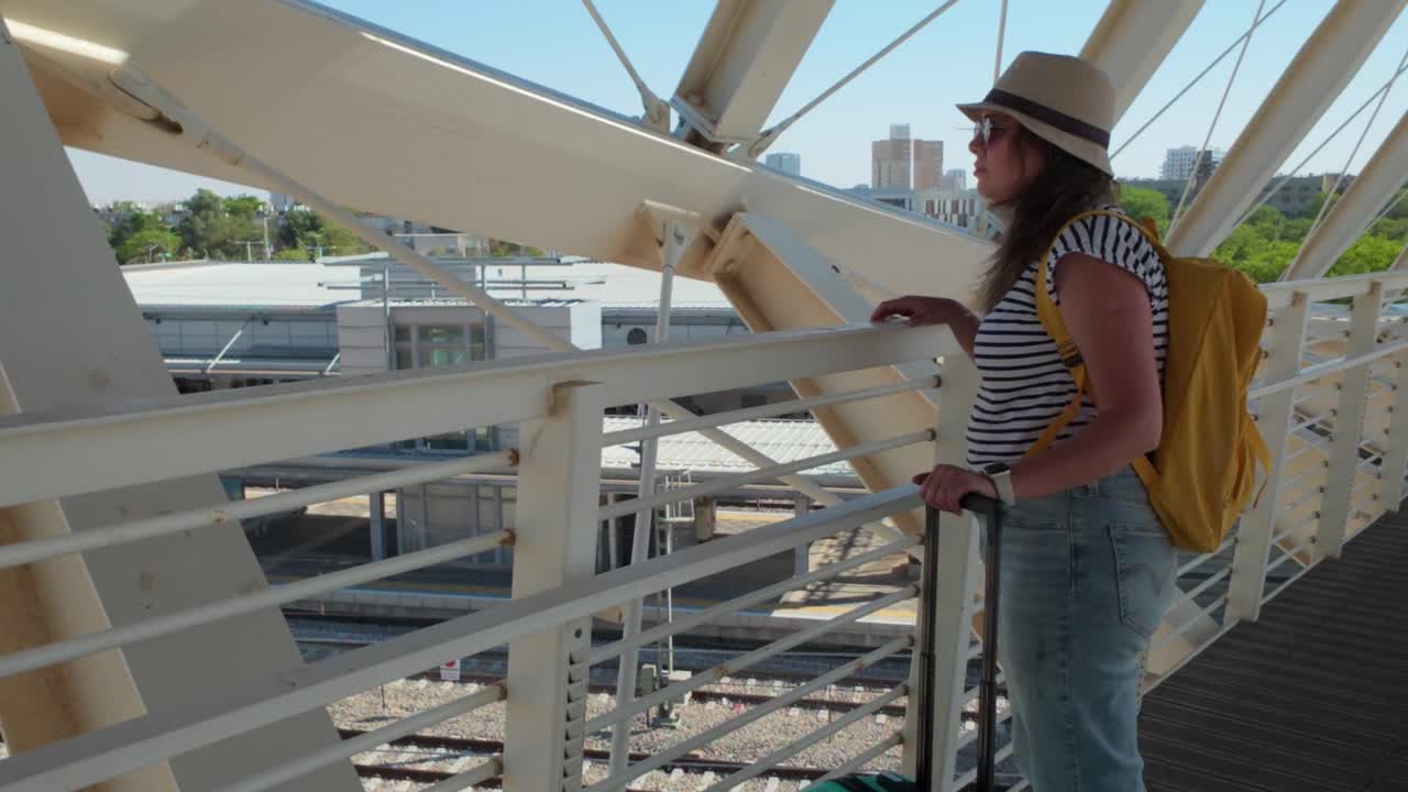 Woman Traveler at Train Station Bridge
