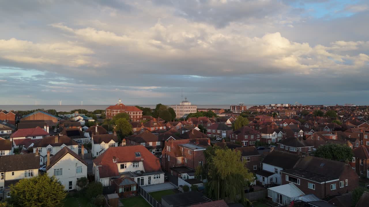 Aerial View of a Coastal Town Residential Area at Golden Hour