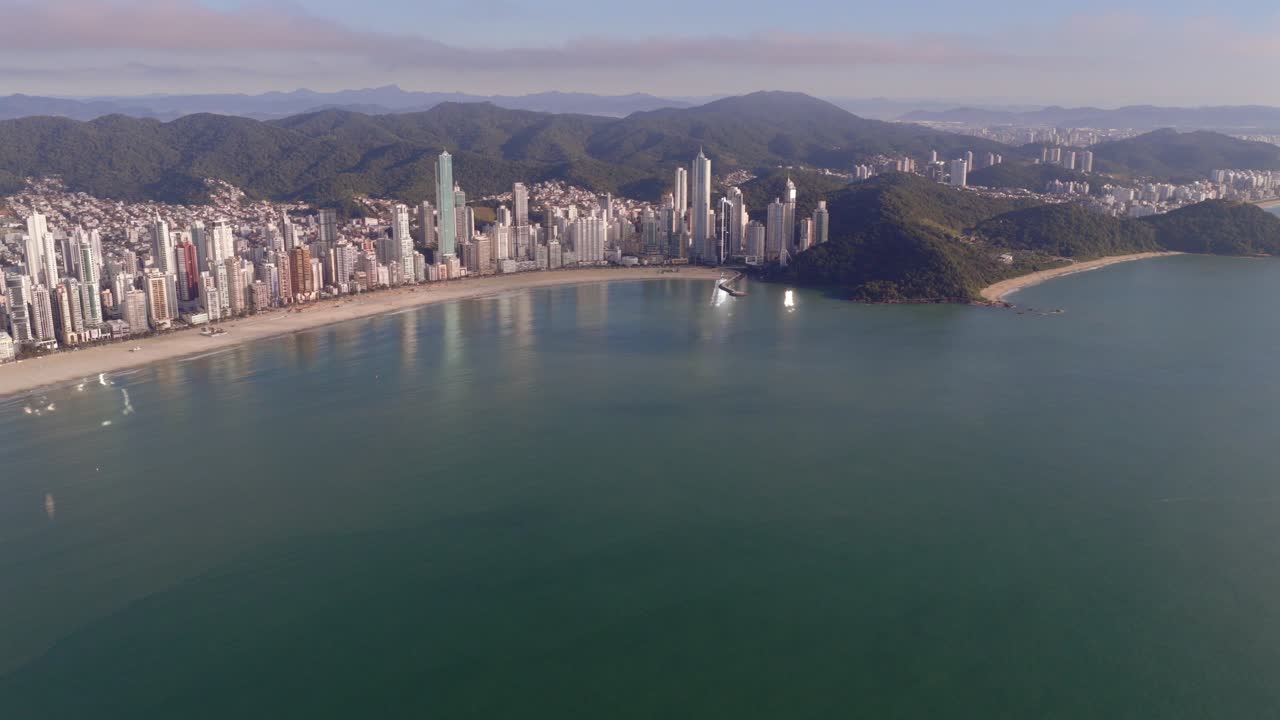 Right side panorama about Barra Sul of Balneário Camboriú coastal skyline from above with Deck do Pontal Norte, Santa Catarina, Brazil