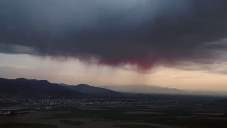 clouds are bleeding down to small town