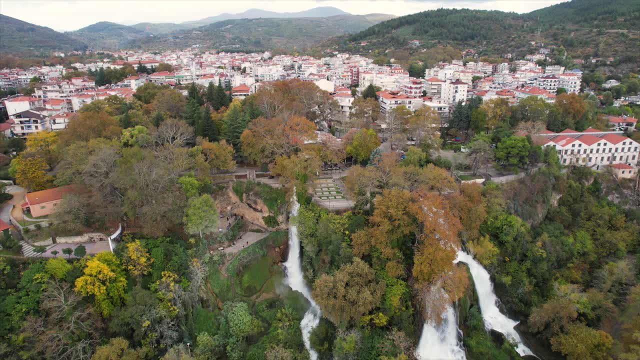 Aerial View of Edessa City Center with Urban Nature with Waterfalls and Stream, Greece Countryside Destination, Aerial Pullback Shot